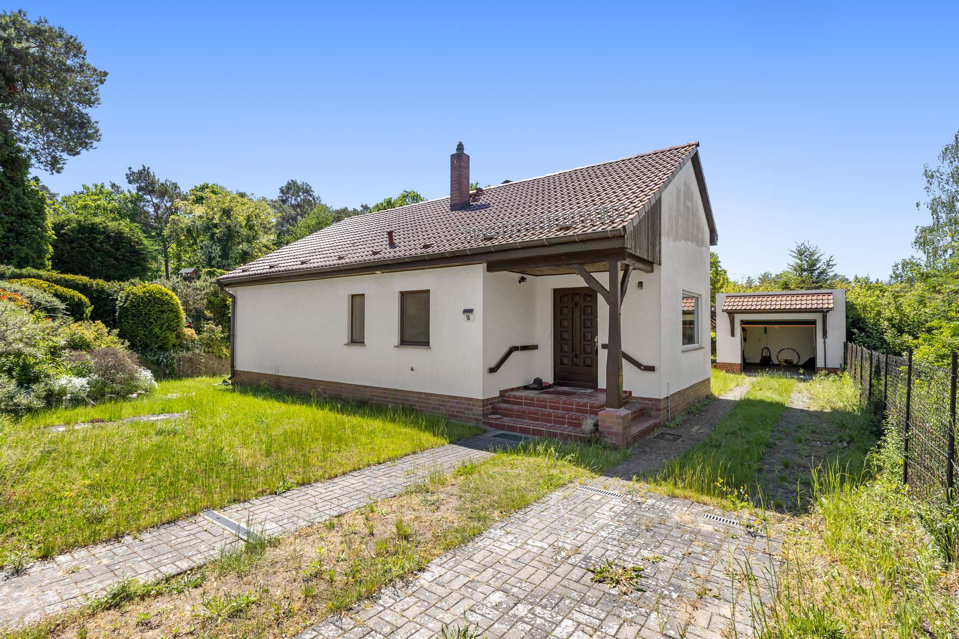 Panoramablick & Kaminromantik: Einfamilienhaus mit idyllischem Garten in Schulzendorf